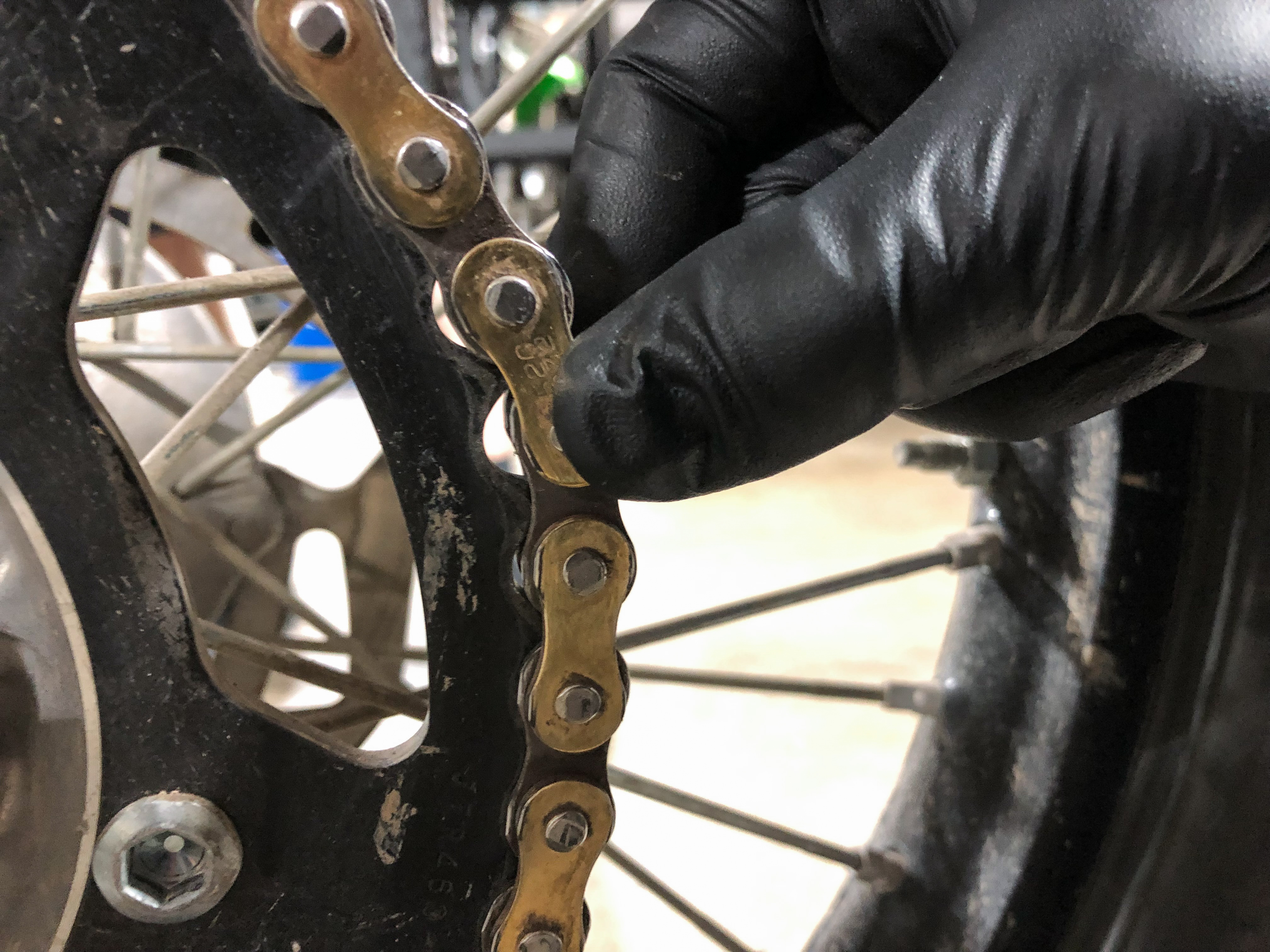 How tight should a mini bike chain sales be